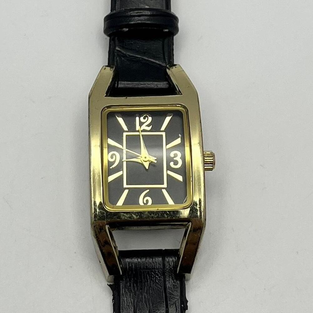 Gold black watch